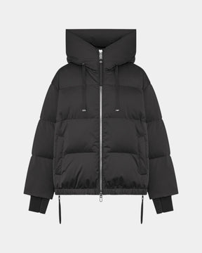 Duno Heka M – Piumino corto oversize in raso tecnico con cappuccio